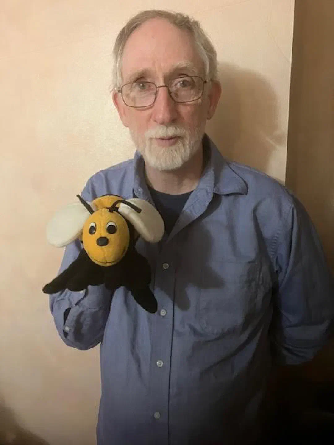 Wes with a bee puppet